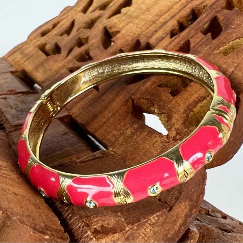 Pink and gold enamel bangle bracelet with spring hinge